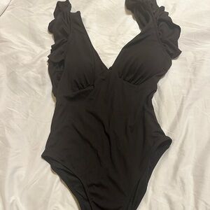 Black swimsuit with ruffle sleeves